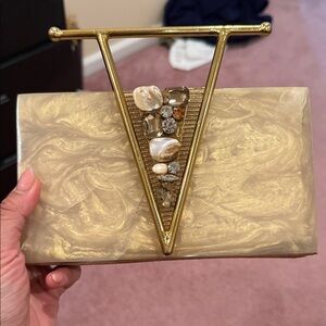 Indian Gold Clutch with Gemstone Accent by brand BeChic